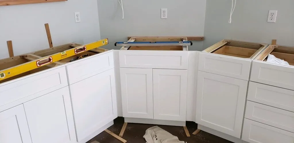 INSTALL THE KITCHEN CABINETS build design center