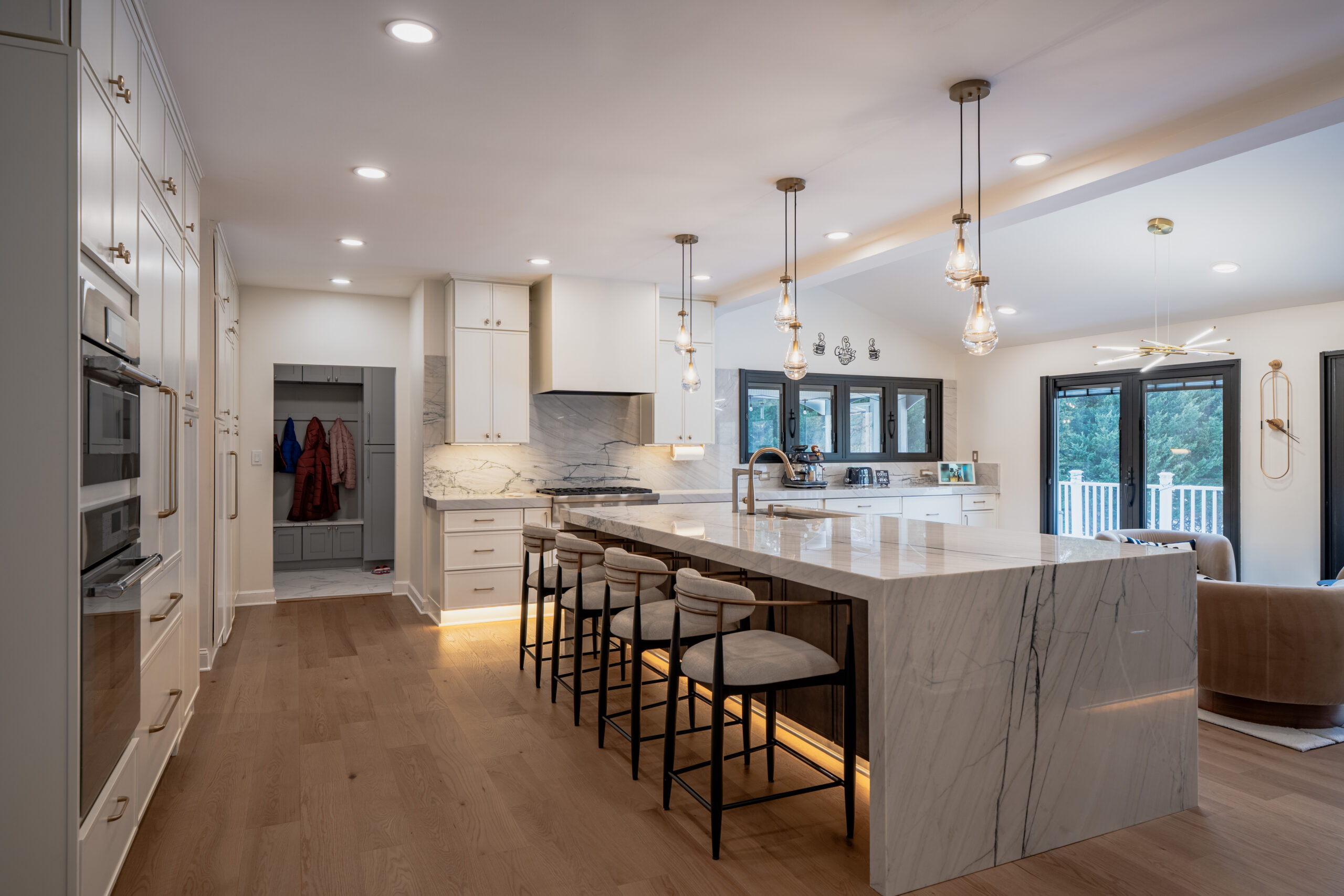 modern kitchen remodeling with quartz countertops and large island