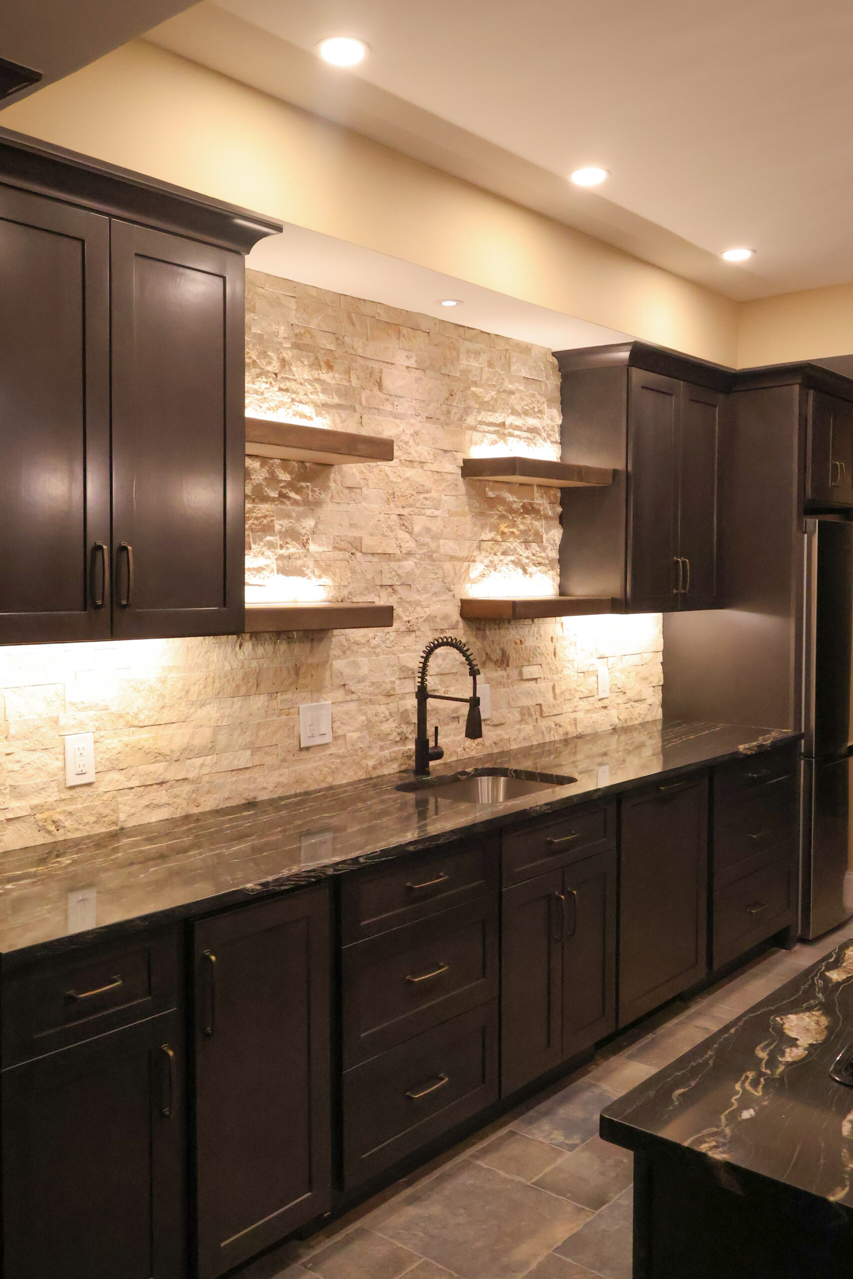 Home bar cabinetry and floating shelves for a Bar remodeling