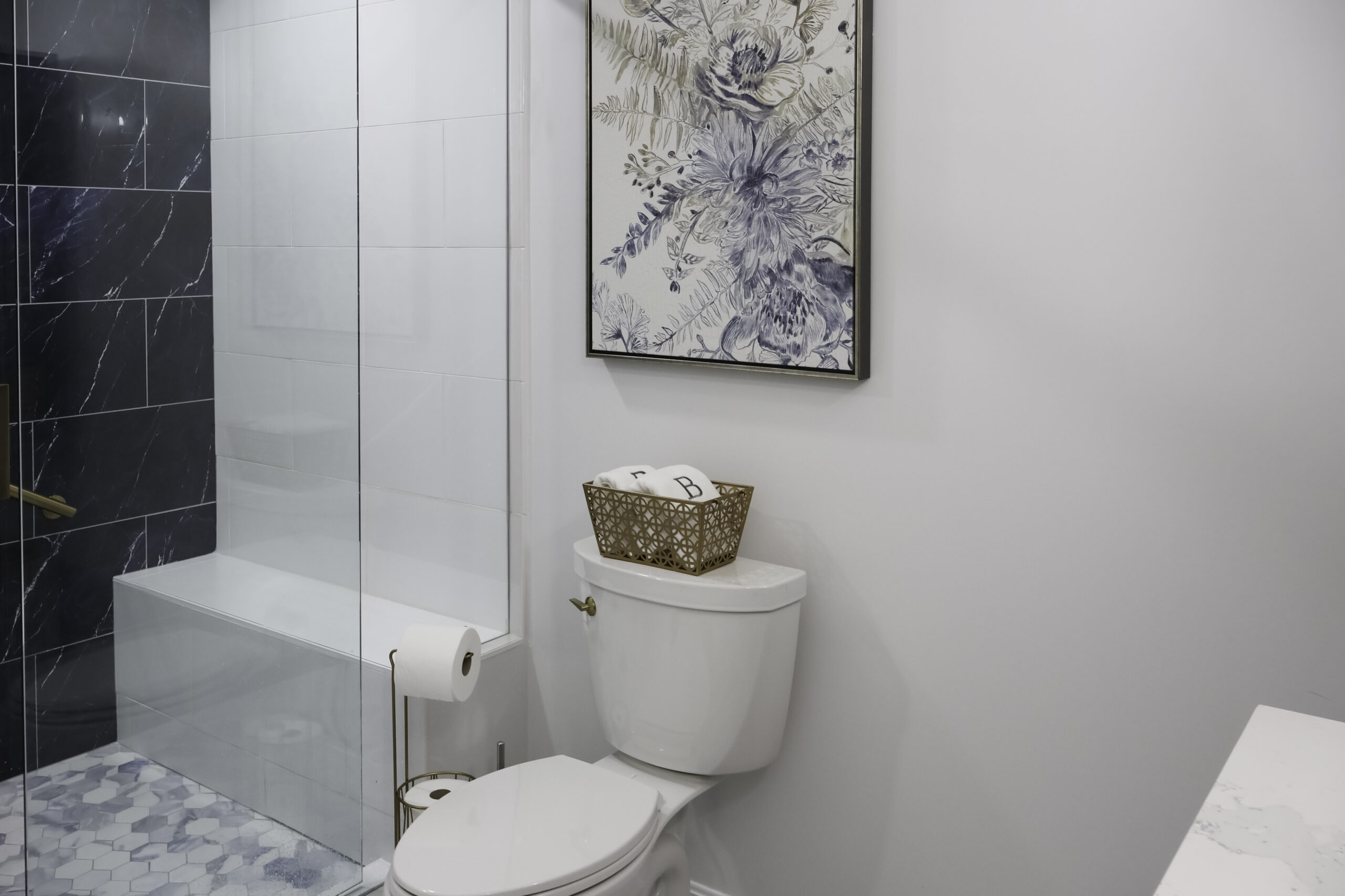 Polished marble look hexagon floor tiles for a Bathroom renovation