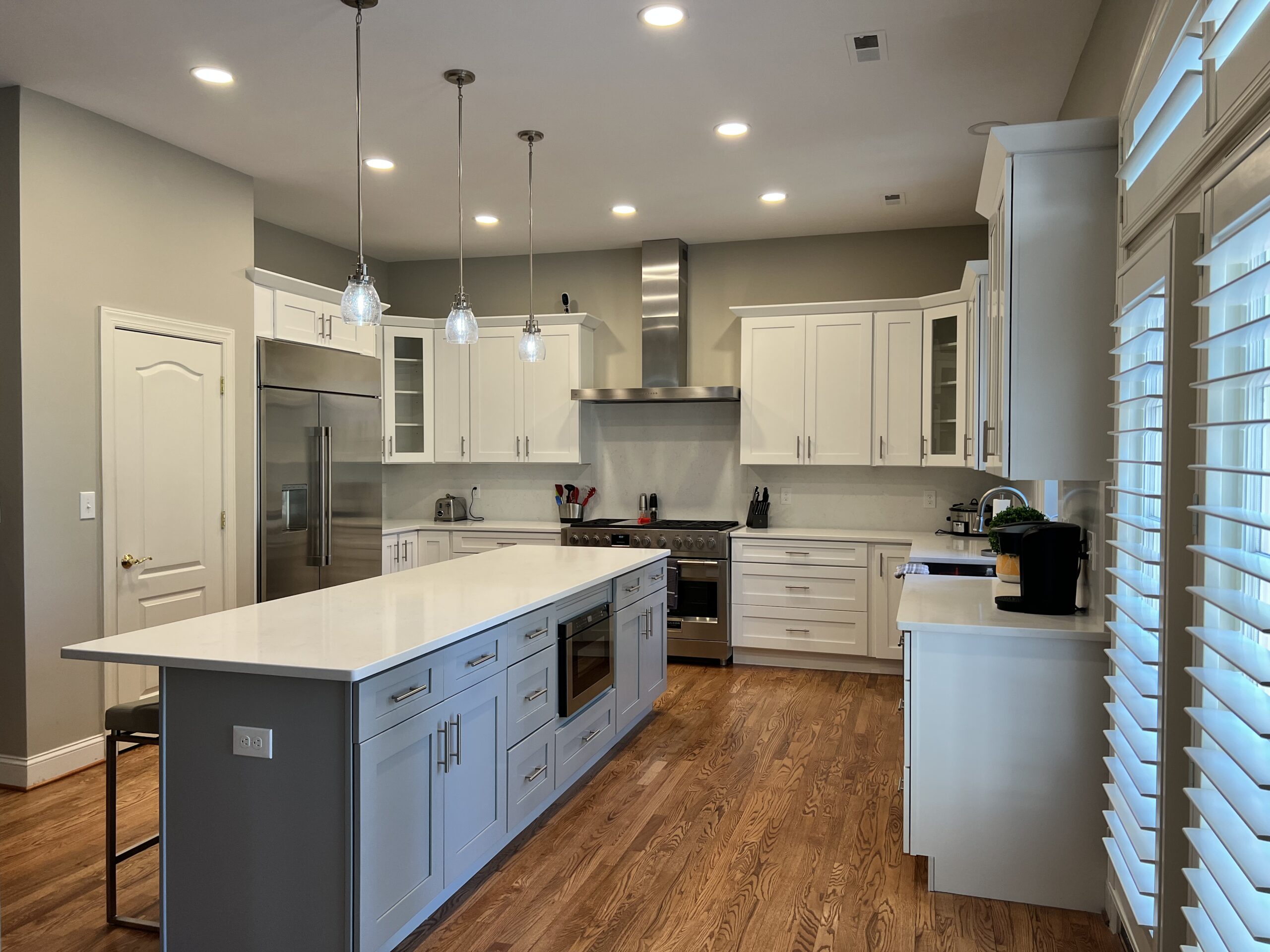 Modern kitchen with updated cabinets, countertops, and appliances