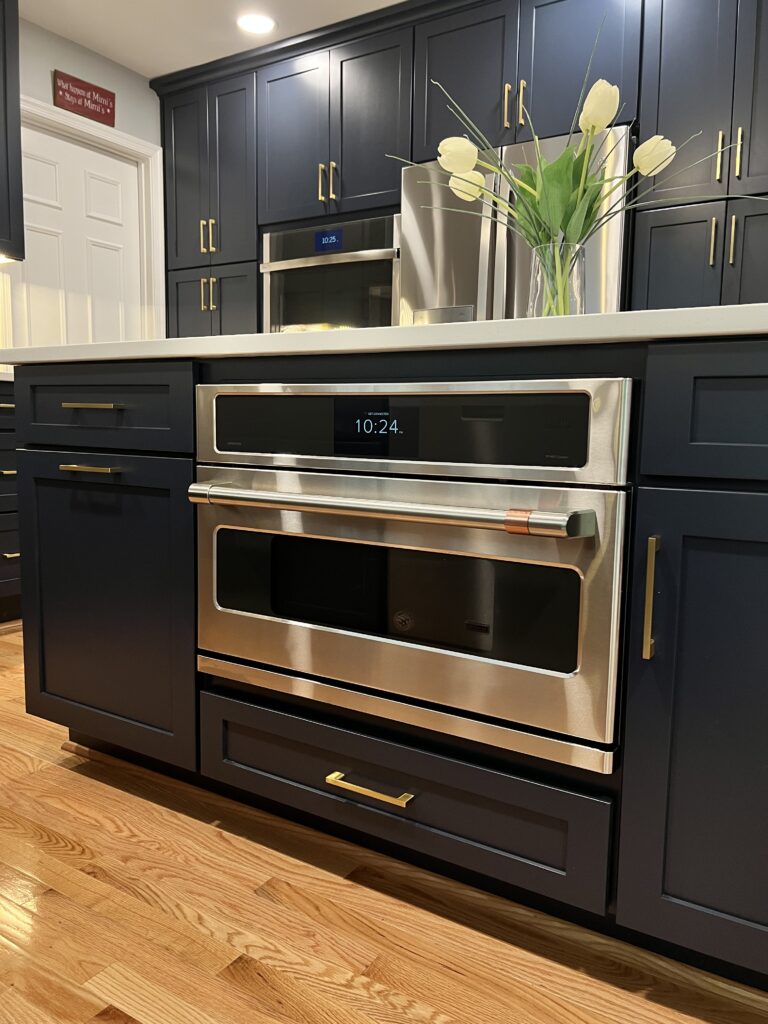 Modern kitchen with stainless steel appliances and updated cabinetry