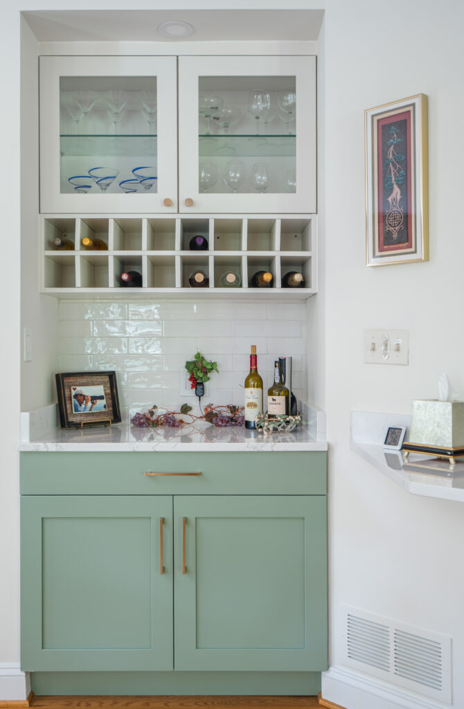 Kitchen cabinets with built-in wine bottle holders